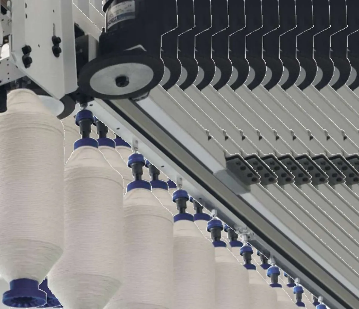 iBTS overhead bobbin transport installed between roving and ring frames