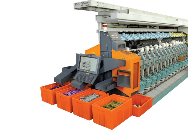 Sortlink Magic bobbin sorter attached to an autowinder with colour-sorted bobbin crates
